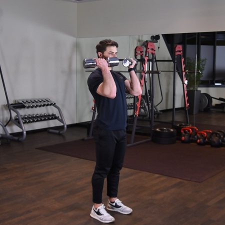 Arnoldki - Wyciskanie hantli nad głowę z rotacją stojąc