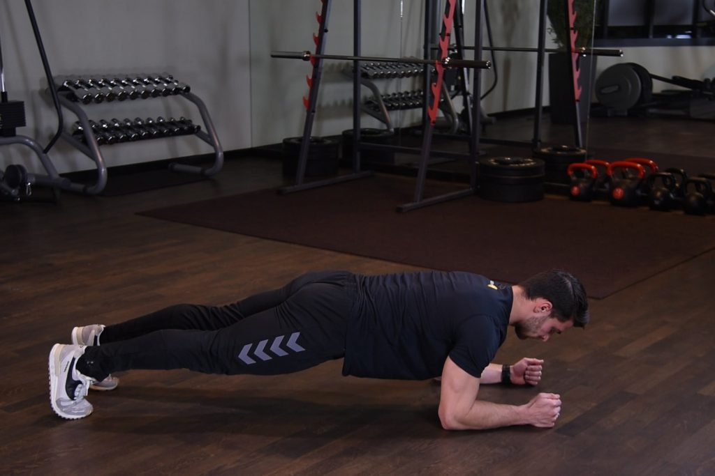 Plank - Izometryczny skurcz mięśni brzucha w podporze przodem