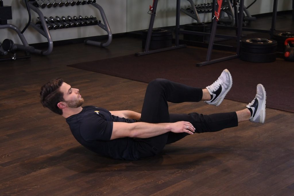 Spięcia brzucha z jedną nogą uniesioną