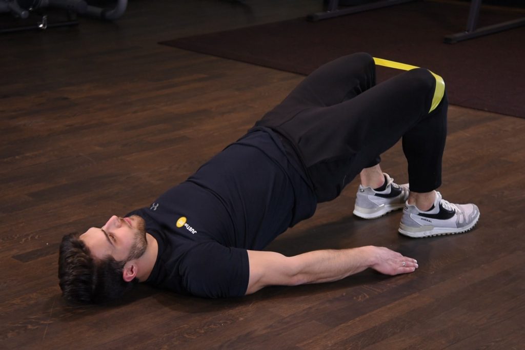 Glute bridge - Wznosy bioder w leżeniu tyłem z gumą mini band