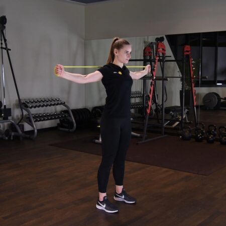 Opuszczanie ramion z gumą power band za głową just be fit