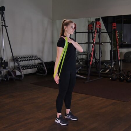 Prostowanie ramienia z gumą mini band stojąc just be fit